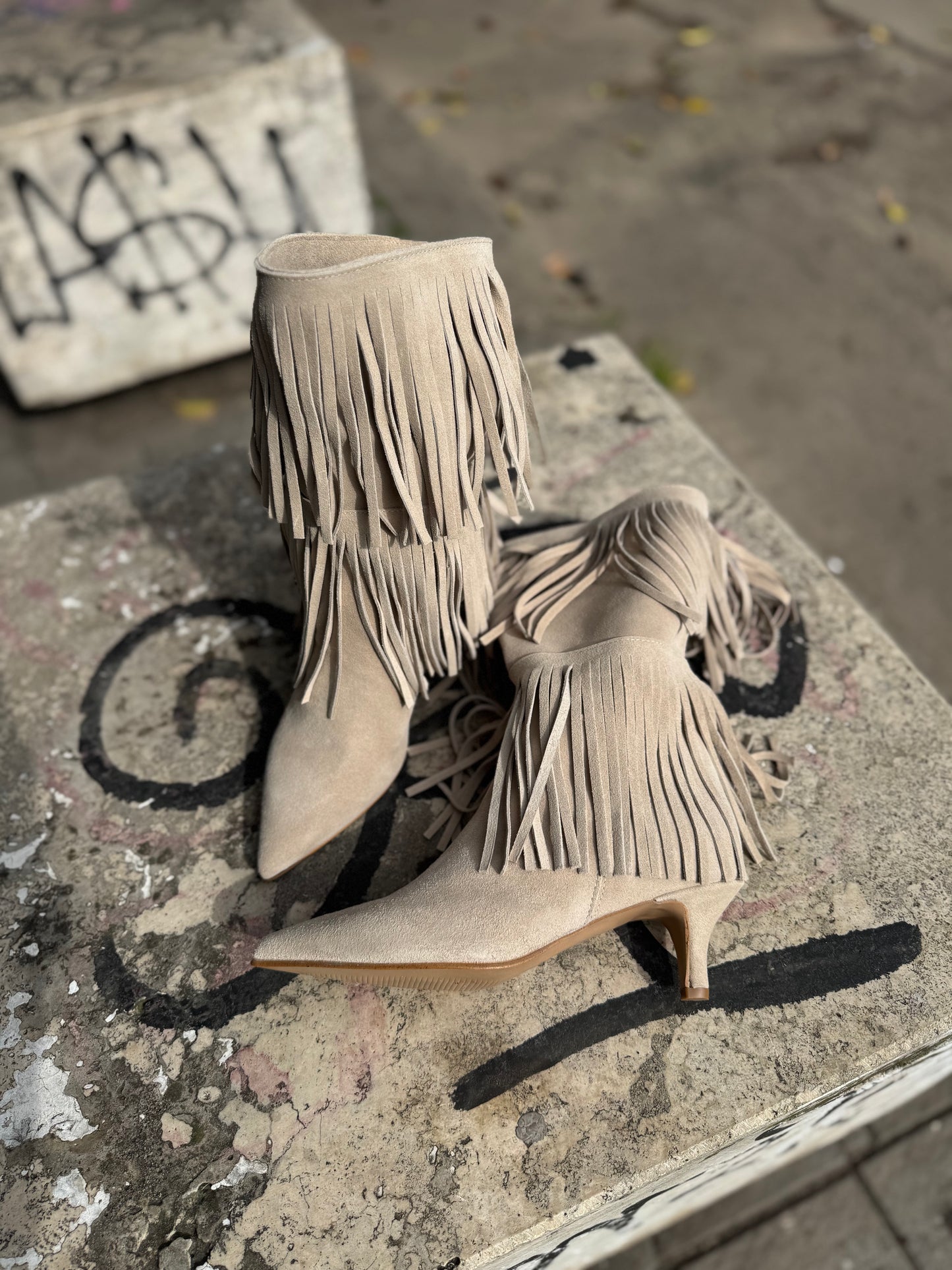 Texano con frange beige