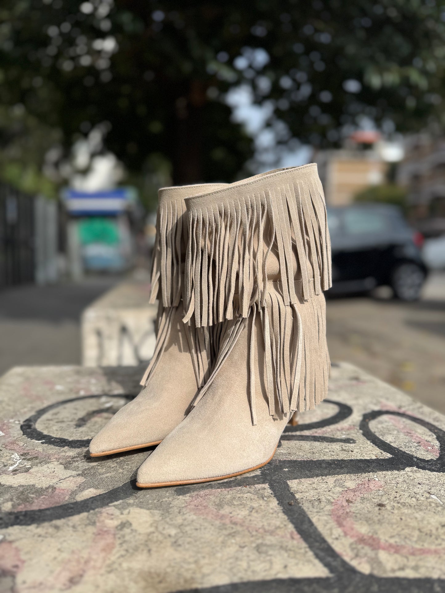 Texano con frange beige